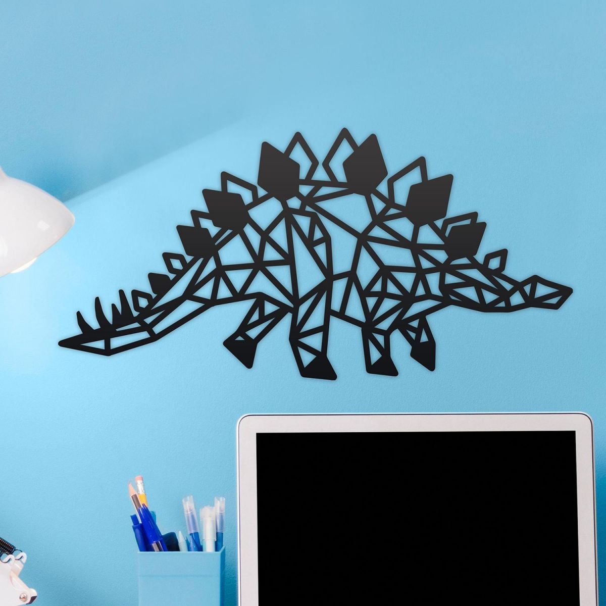 Geometric Iron Stegosaurus Wall Art on a Blue Wall Geometric Iron Stegosaurus Wall Art on a Blue Wall