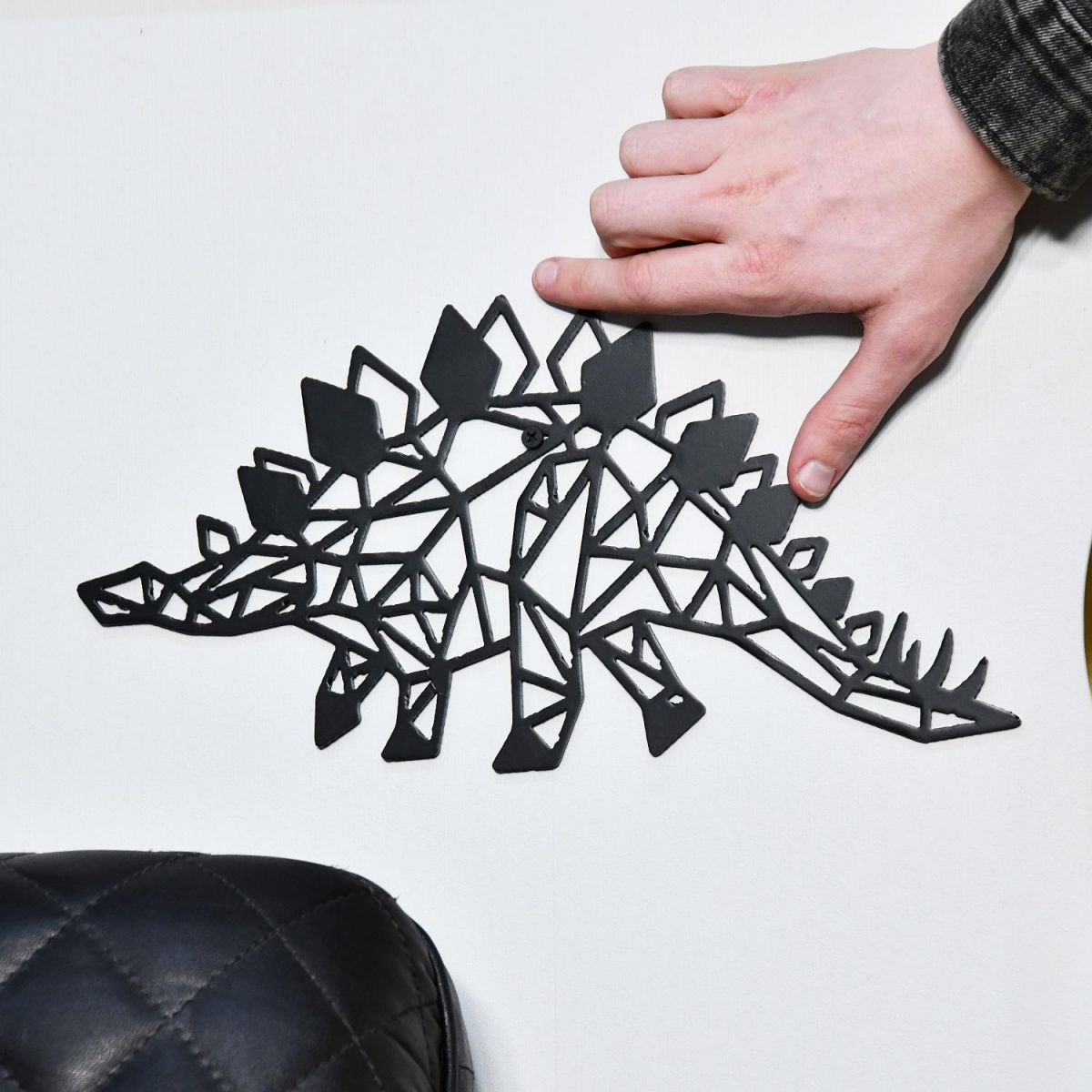 Geometric Stegosaurus Wall Art with hand for scale  Geometric Stegosaurus Wall Art with hand for scale