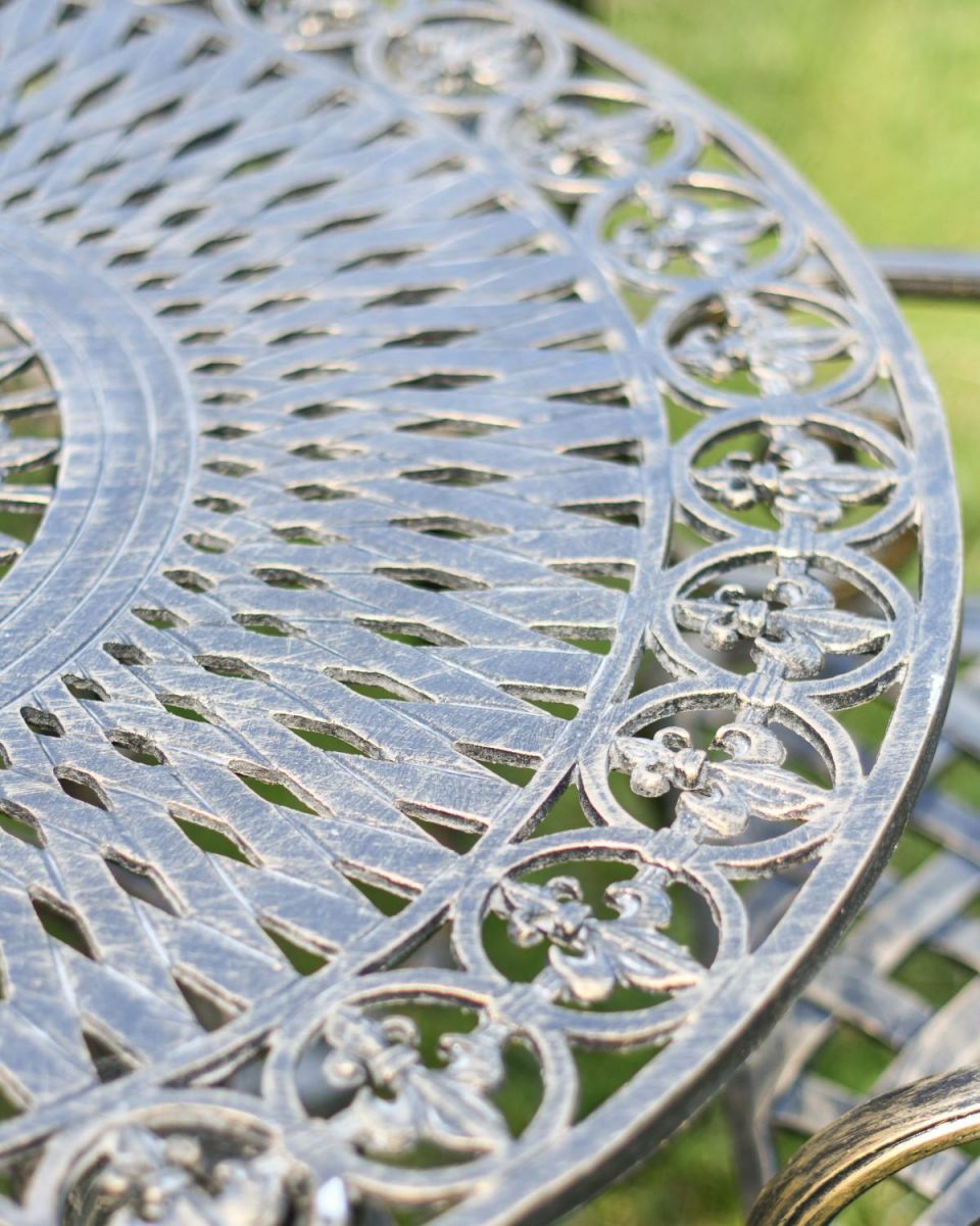 Close-Up of Ornate Pattern on Oval Table Close-Up of Ornate Pattern on Oval Table