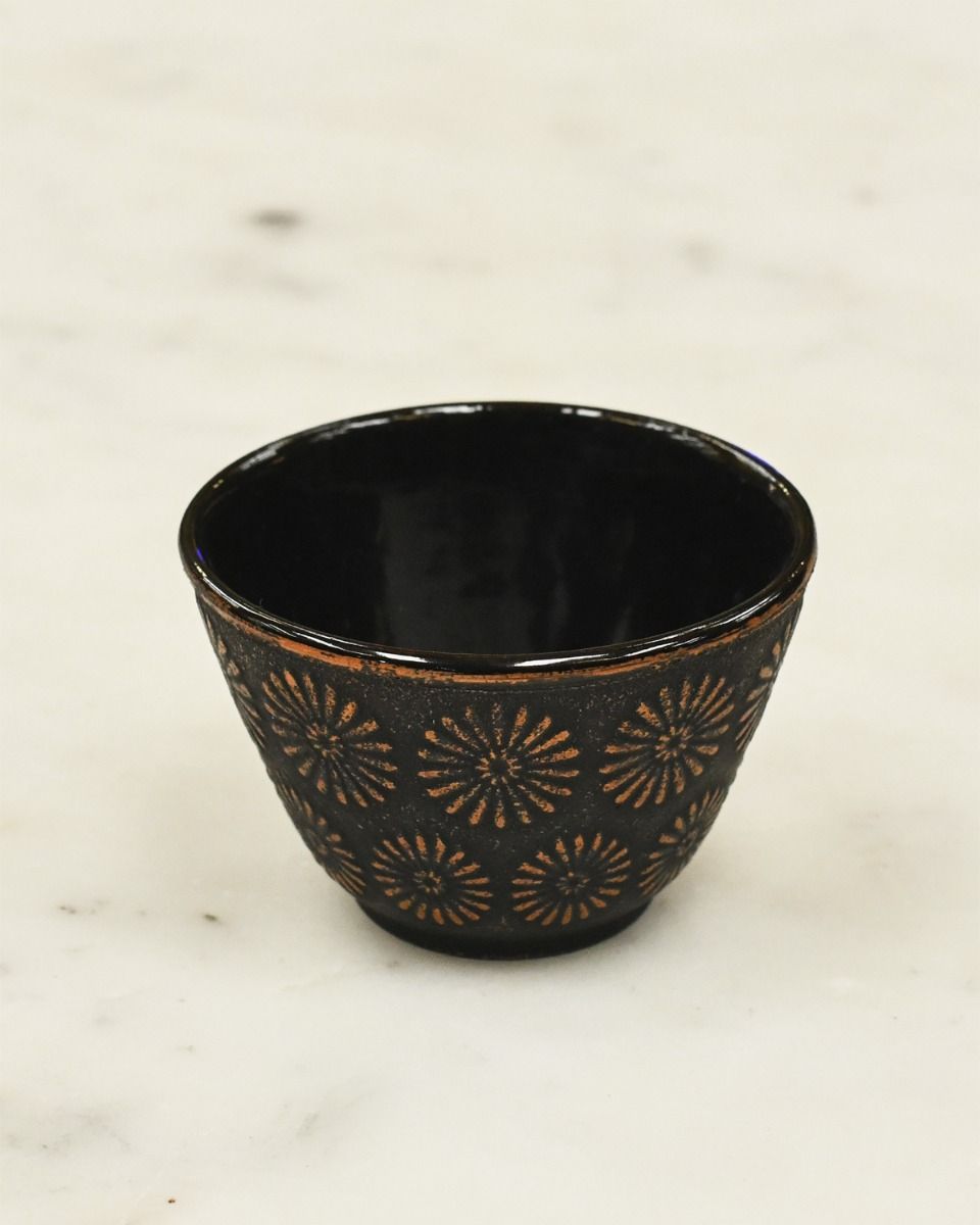 Close up of Cast iron Tea Cup 