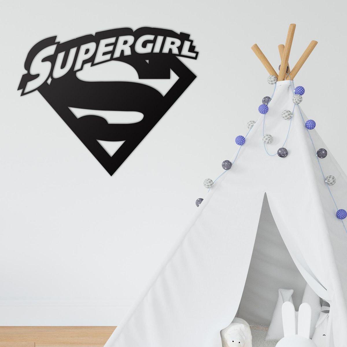 "Supergirl" Wall Art in a Children"s Play Room