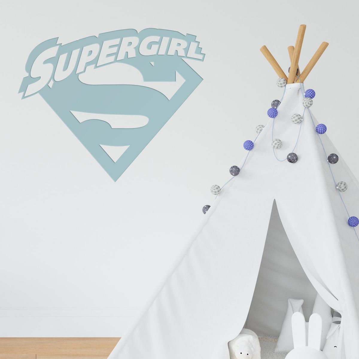 "Supergirl" Wall Art in a Children"s Play Room