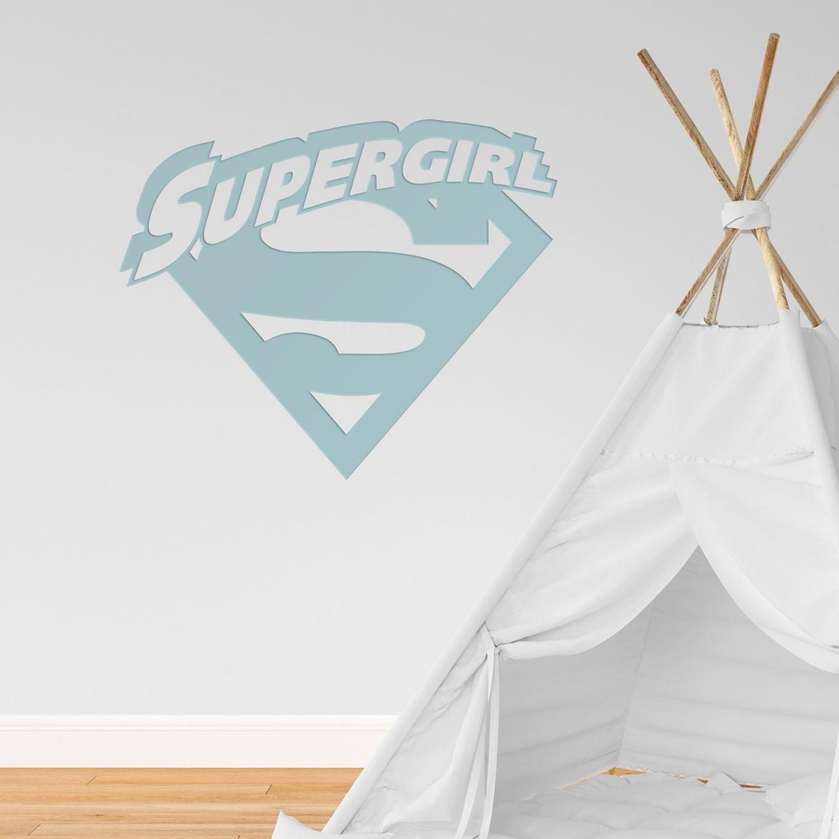 "Supergirl" Wall Art in a Children"s Play Room