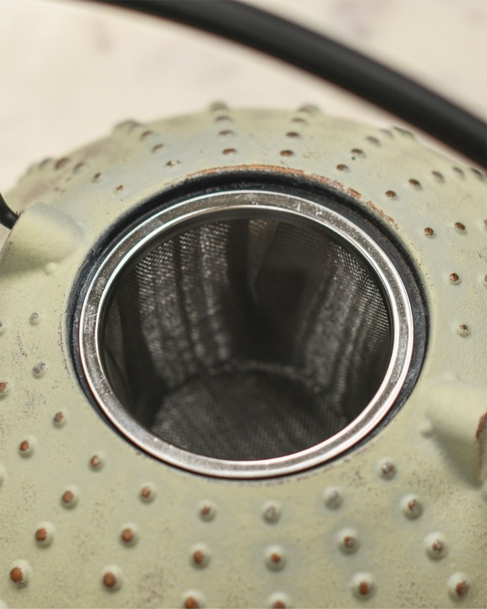 Metal Tea Infuser in Teapot  Metal Tea Infuser in Teapot