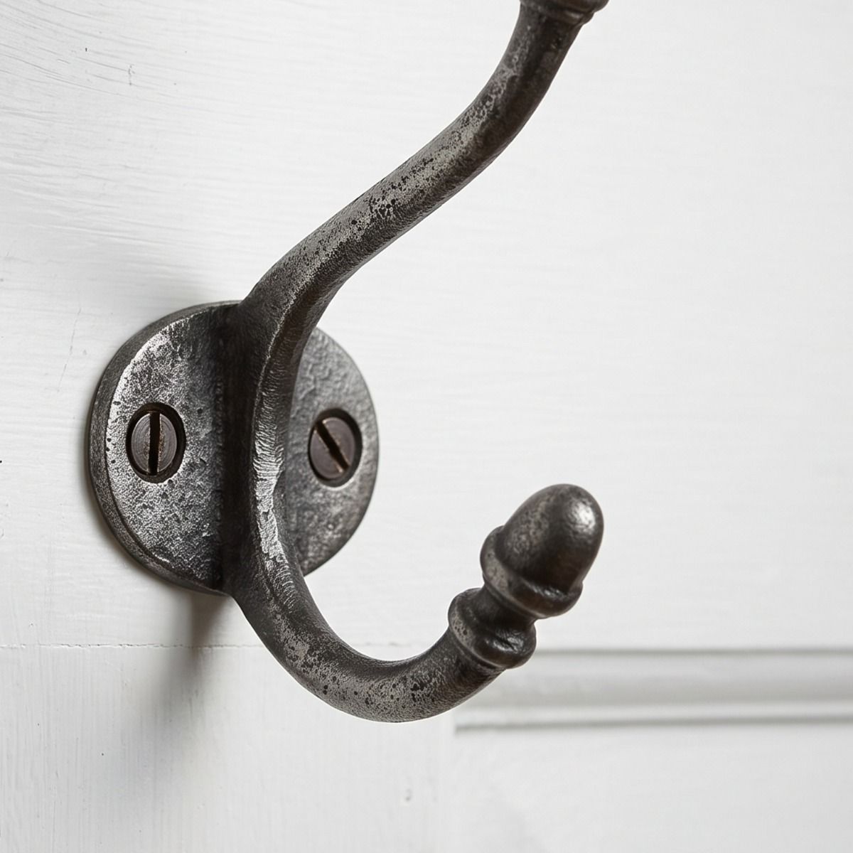 The Ironmonger Acorn Light Green Ceramic Coat Hook - 125mm Showing a Close up of the Lower Hook - Digital Illustration