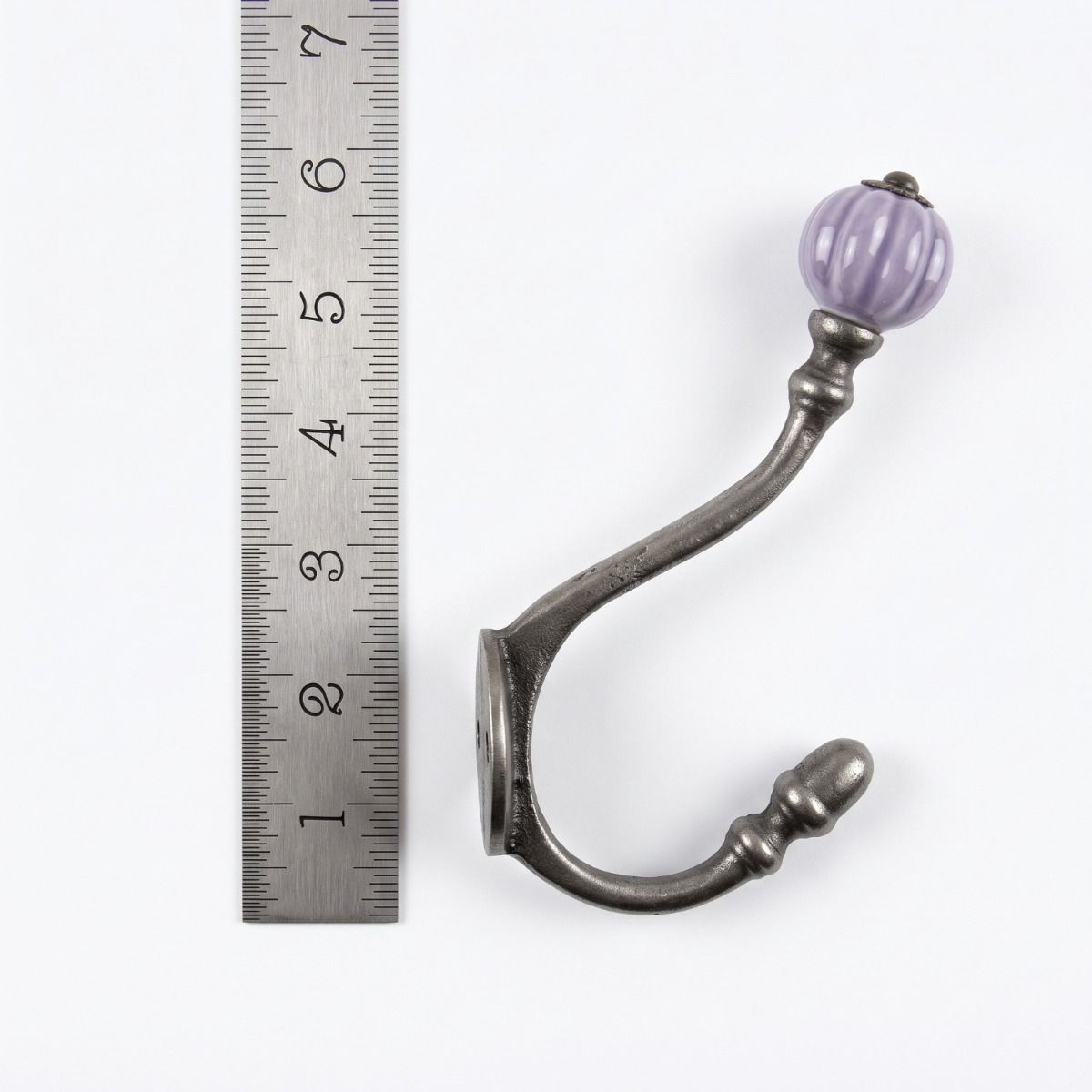 The Ironmonger Acorn Purple Ceramic Coat Hook - 125mm On a White Background  with a Ruler for Scale - Digital Illustration