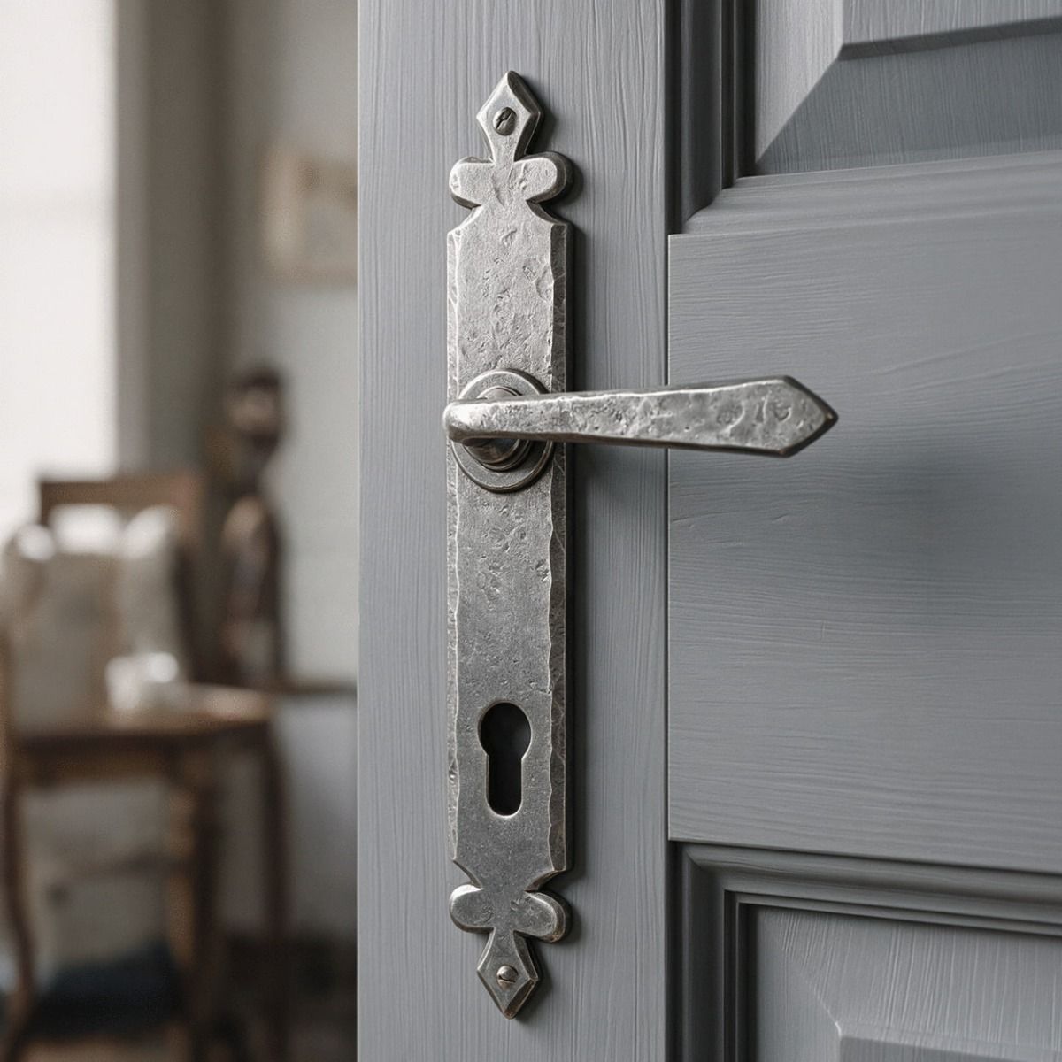 The Vittoria Pewter Unsprung Tudor Espagnolette Lever Set on an Open Grey Door in a Home - Digital Illustration