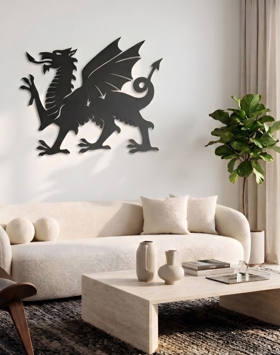The 100cm Black Welsh Dragon Wall Art Mounted on a White Coloured Living Room Wall with a Sofa Below in a Contemporary Home - Digital Illustration