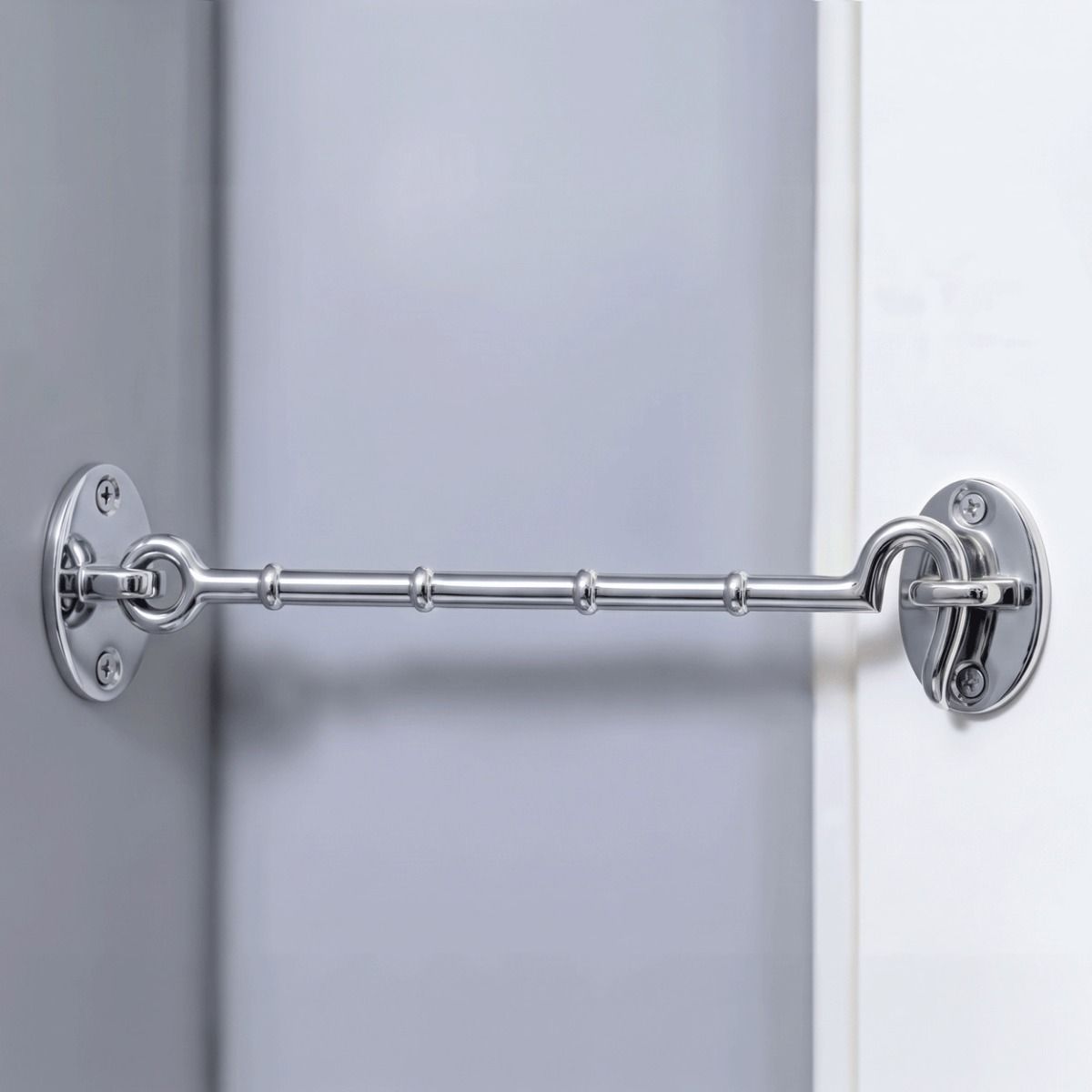 The 12" Bright Chrome Cabin Hooks Loose Ring Type Holding a Door Open in a Modern Home - Digital Illustration