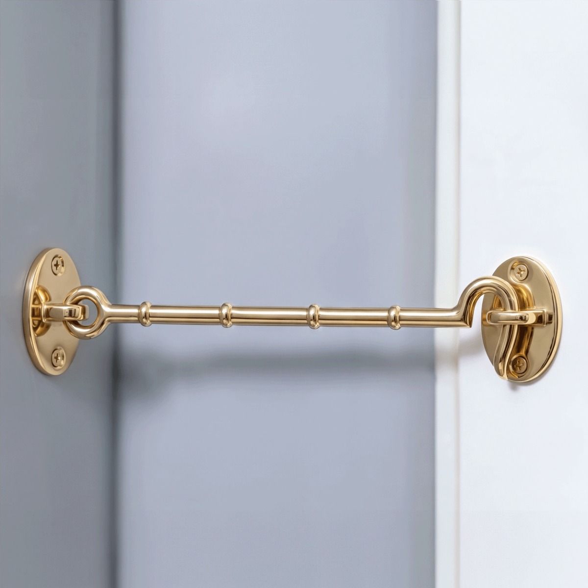 The 12 inch Brass Cabin Hooks Loose Ring Type Mounted on a Grey Wall Holding Open a Door - Digital Illustration