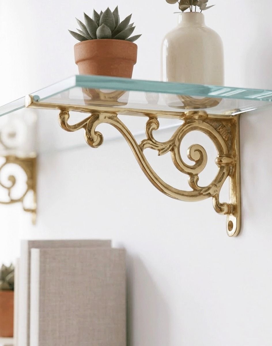 The 12 x 21cm "Luciano" Ornate Scroll Brass Wall Bracket Mounted on a White Wall in a Modern Home Shown from the Side - Digital Illustration 
