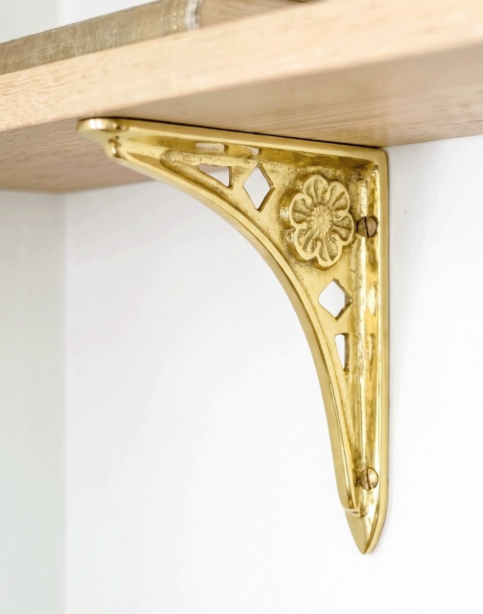 The 15 x 15cm “Tudor Rose” Shelf Bracket Mounted on a Modern White Interior Wall - Digital Illustration 