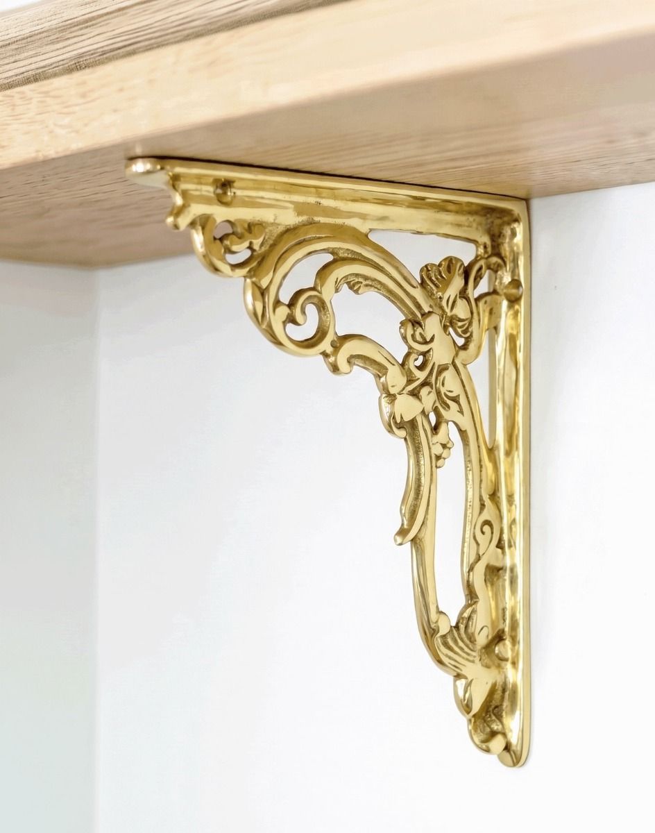 The 18cm x 14cm Ornate Scroll Polished Brass Bracket Mounted on a DIY Wooden Shelf in a Modern Home - Digital Illustration 