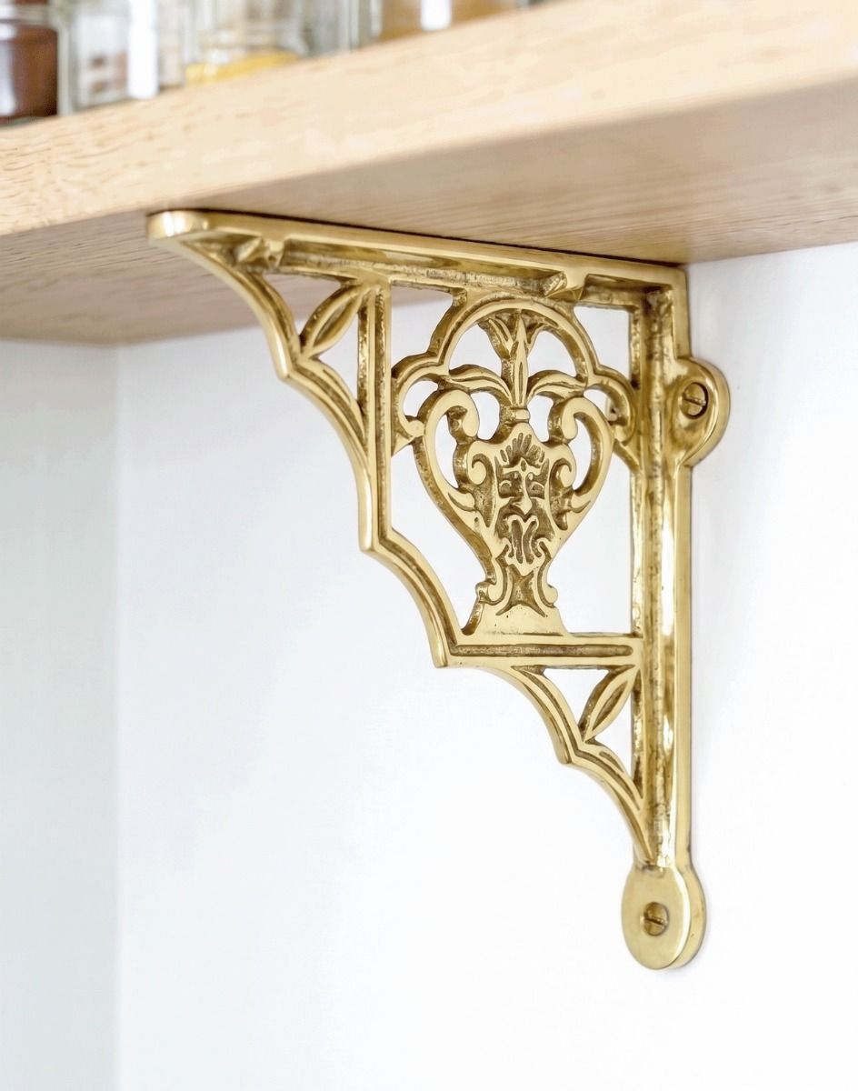 The 19cm x 16cm "Blossville" Brass Wall Bracket Used as a Wall Hanger on a Wooden Shelf - Digital Illustration 