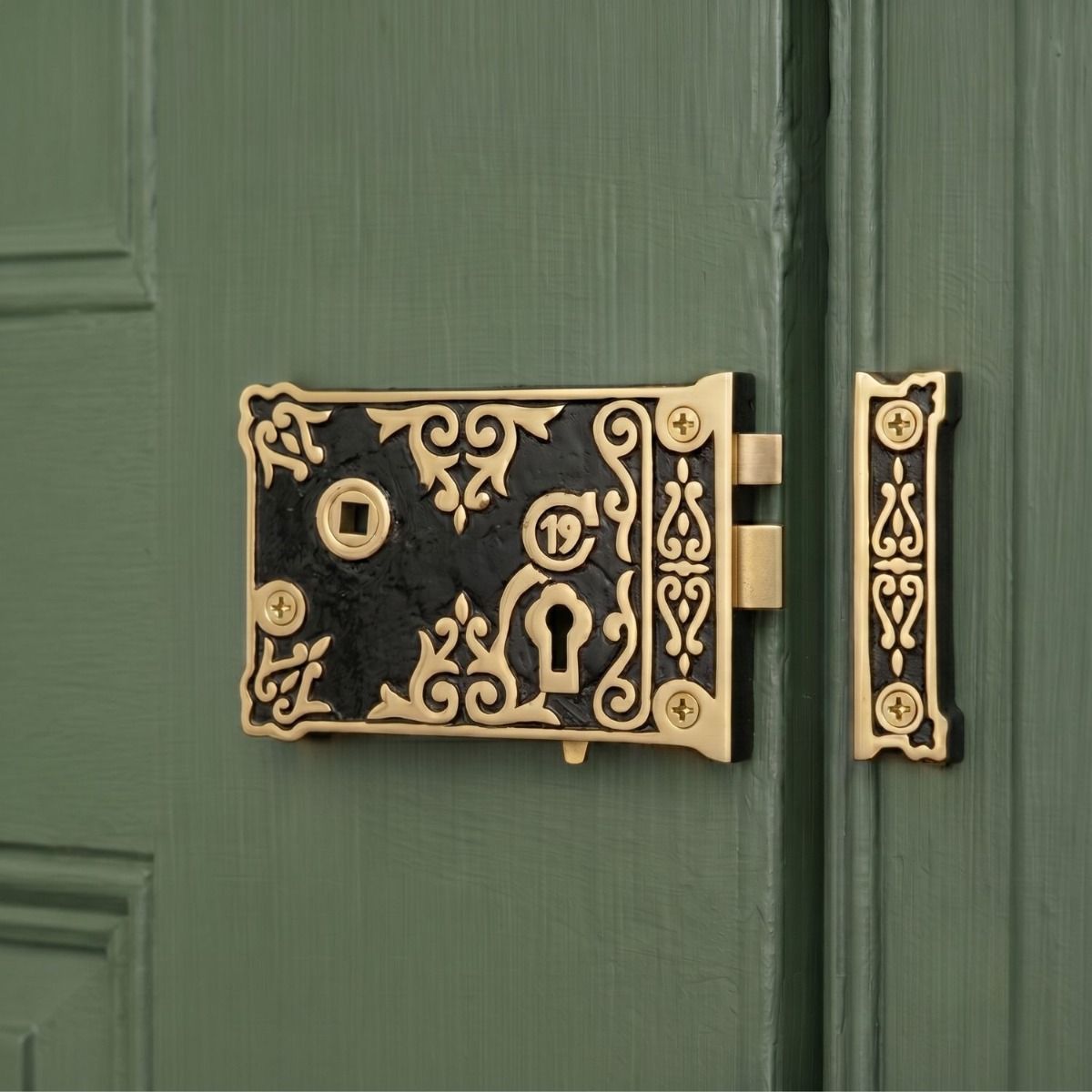 The "Adwick" Deluxe Victorian Rim Lock with Draw Bolt for a Left Handed Door on a Green Front Door Entrance - Digital Illustration 