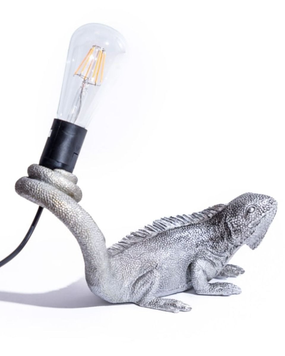 The "Arboreal Guardian" Iguana Wall Light in Silver Shown Laid on a Flat Surface instead of a Wall