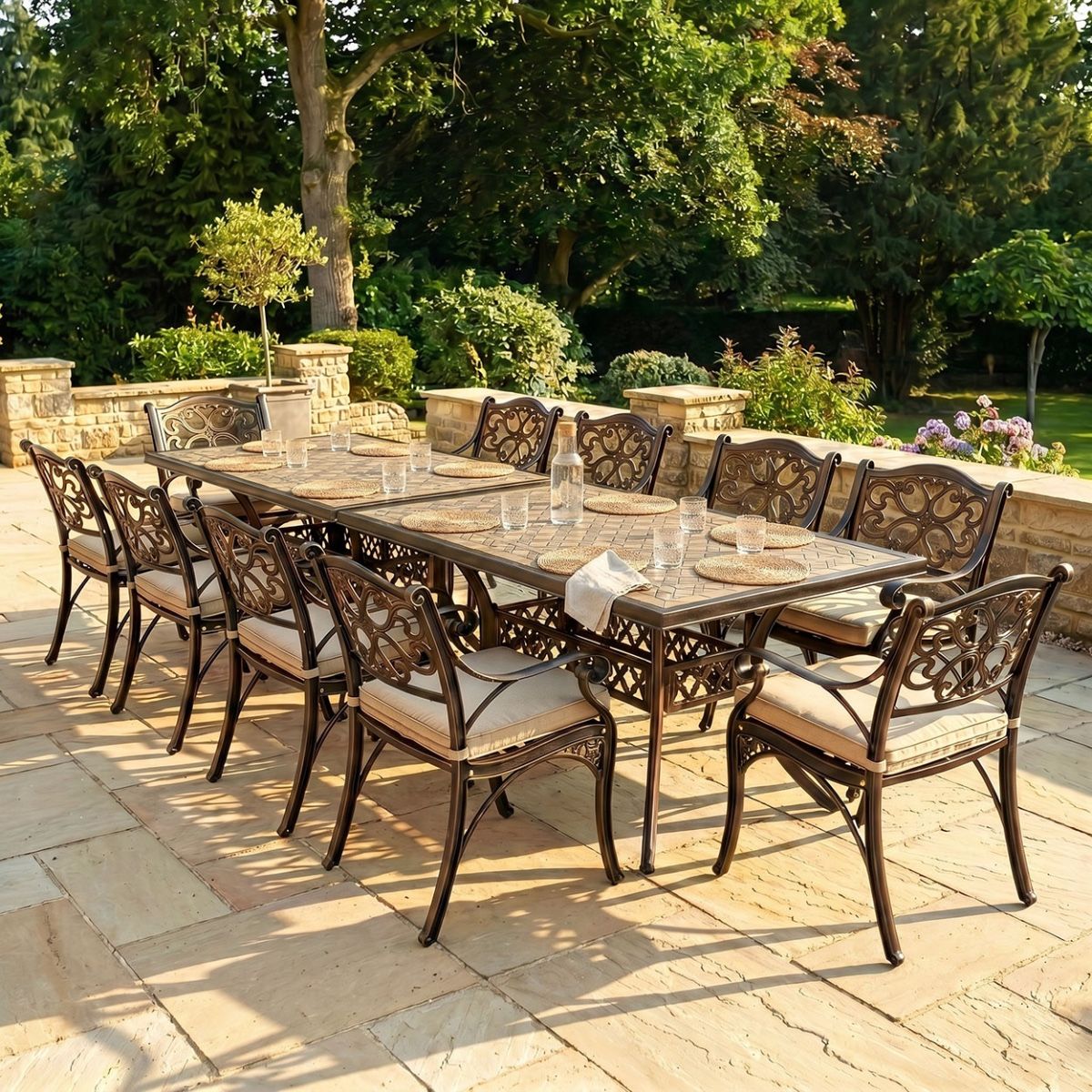 The "Attingham Grand" 12-Seater Outdoor Dining Set - Antique Copper Digital Illustration Dressed Table