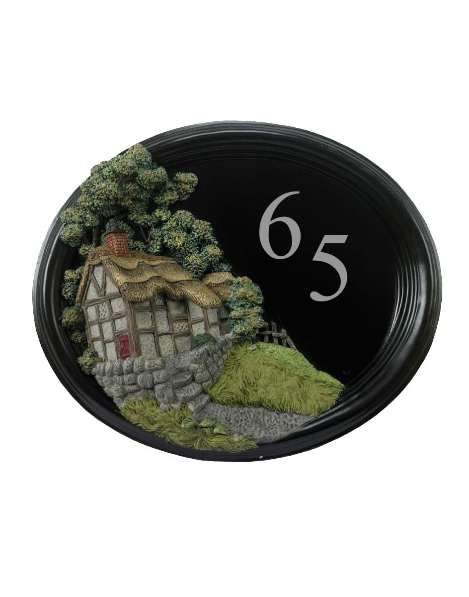 The "Avenbury Thatch" Hillside Cottage Oval House Sign Shown on a White Background 
