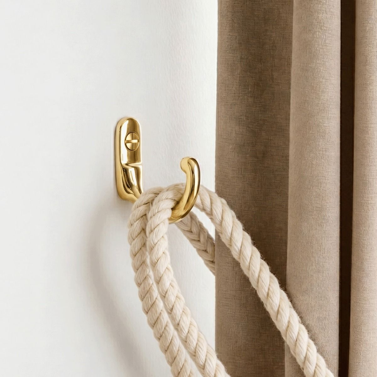 The "Castleford" Curtain Tie Back Hook Mounted on a White Interior Wall Holding a Curtain Back - Digital Illustration