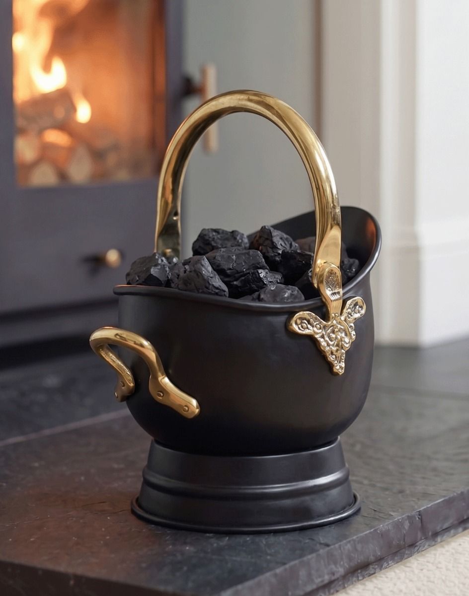 The "Countess" Black Iron & Polished Brass Coal Bucket Positioned on a Black Stone Fireplace - Digital Illustration 