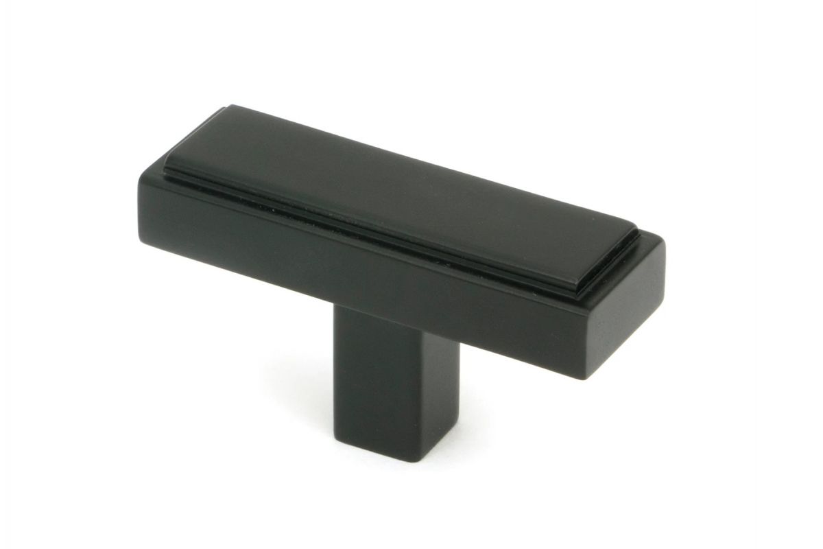 The "Emerson" Rectangular T-Bar Cabinet Pull Handle in a Matt Black Finish on a White Background Shown at an Angle