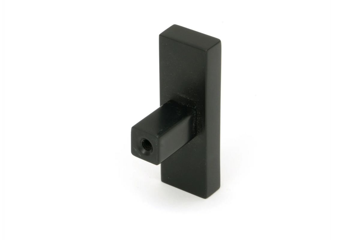 The "Emerson" Rectangular T-Bar Cabinet Pull Handle in a Matt Black Finish on a White Background Shown from Behind