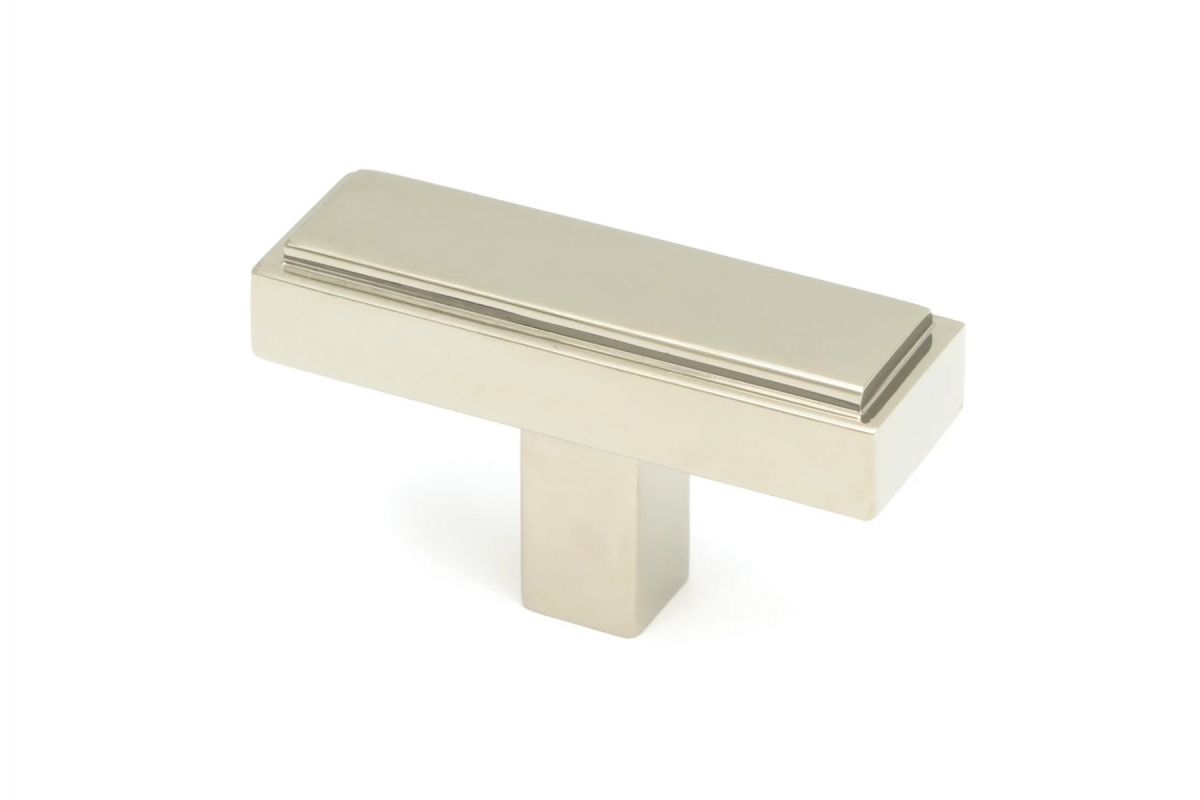The "Emerson" Rectangular T-Bar Cabinet Pull Handle in a Polished Nickel Finish on a White Background Shown at an Angle