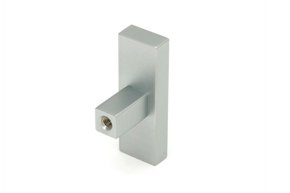 The "Emerson" Rectangular T-Bar Cabinet Pull Handle in a Satin Chrome Finish on a White Background Shown from Behind