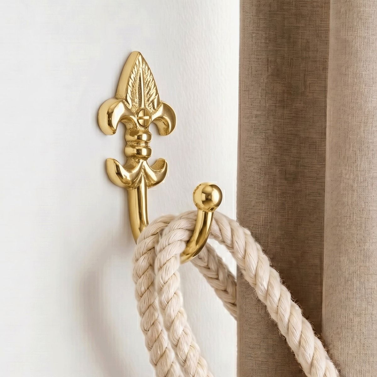 The "Fleur De Ly’s" Curtain Tie Back Fitted on a Modern White Interior Wall Next to a Brown Curtain - Digital Illustration