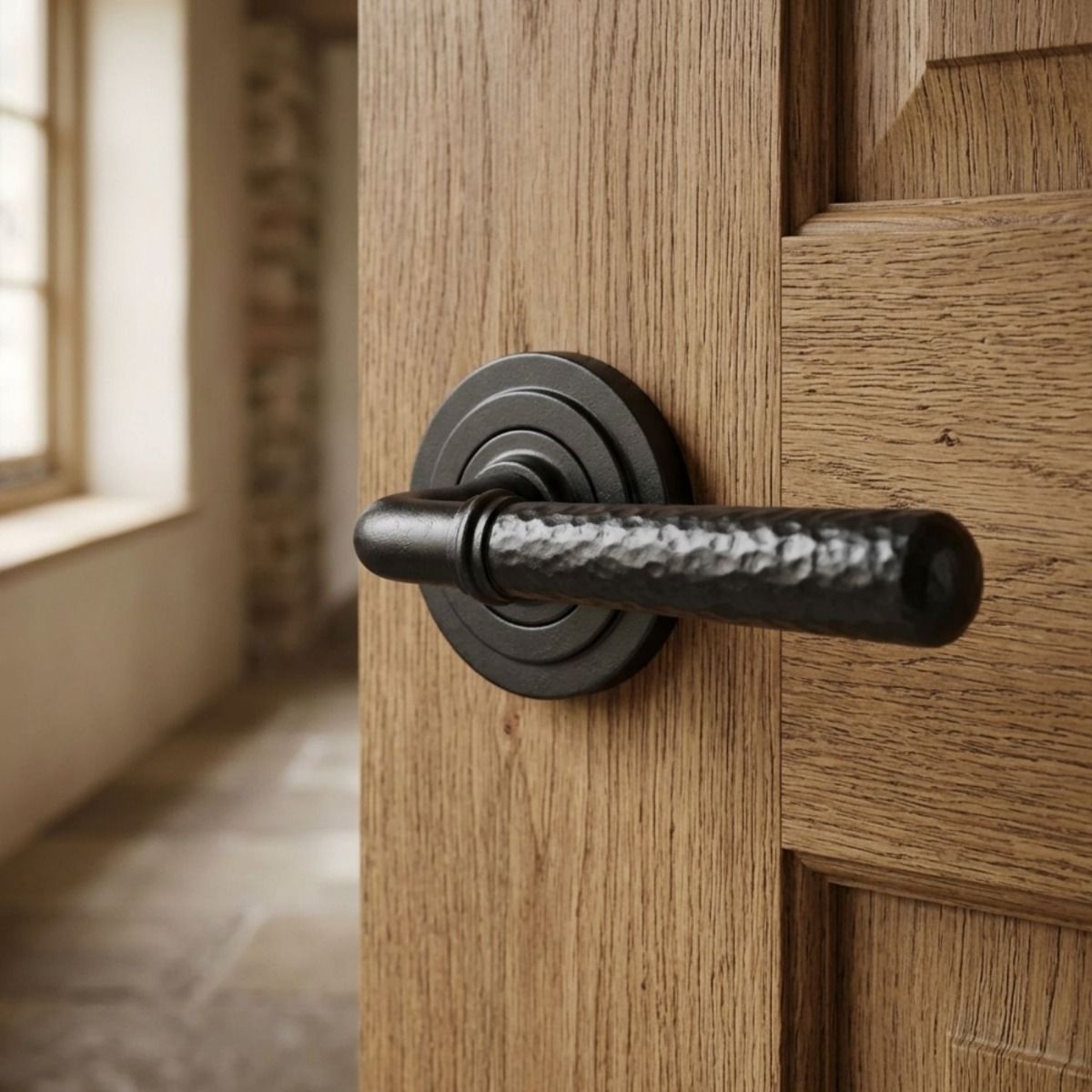The "Franbury" Black Hammered Lever Door Handle on Art Deco Rose on a Wooden Door in a Tiled Hallway - Digital Illustration 