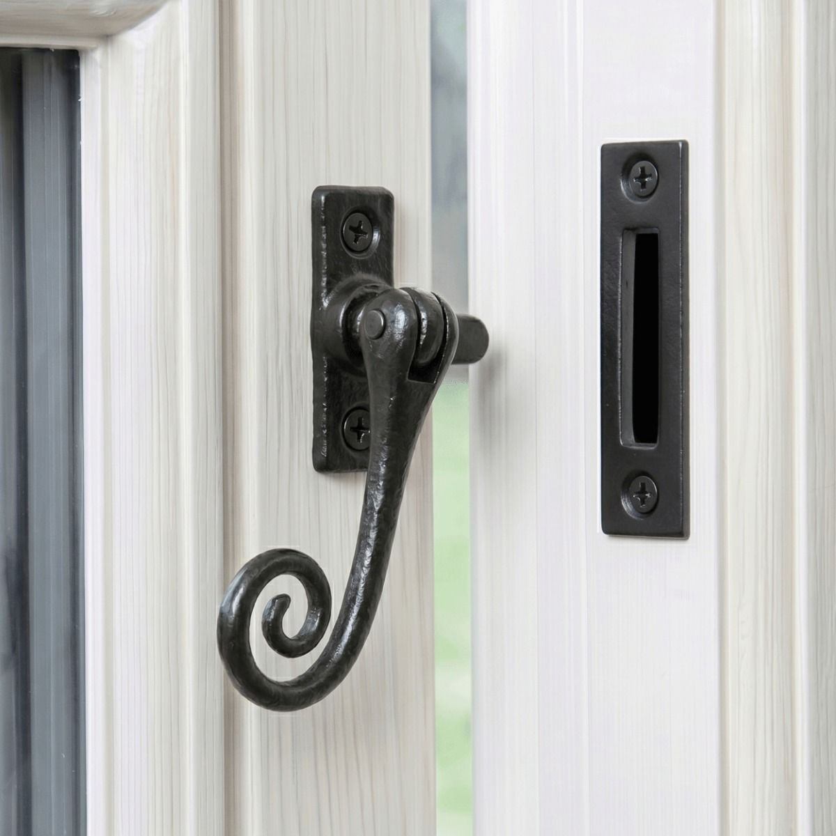 The "Grenhurst" Iron Window Casment Stay Mounted on a Classic White Window Frame in a Country Home - Digital Illustration