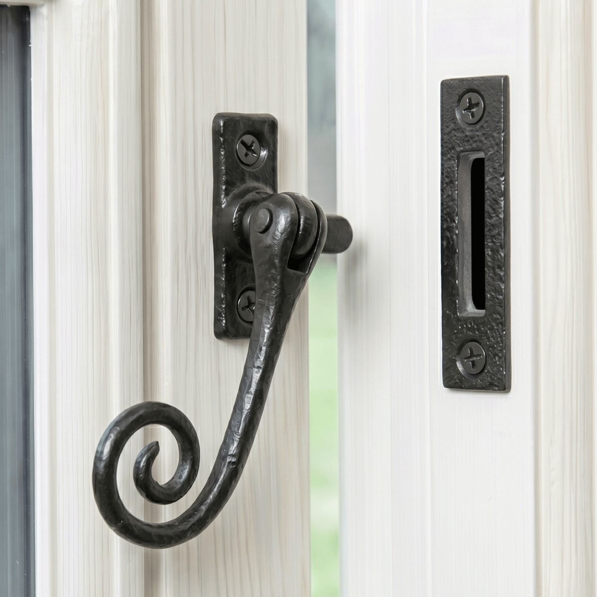 The "Harebank" Locking Casement Stay Fitted on a Handpainted White Window Frame - Digital Illustration
