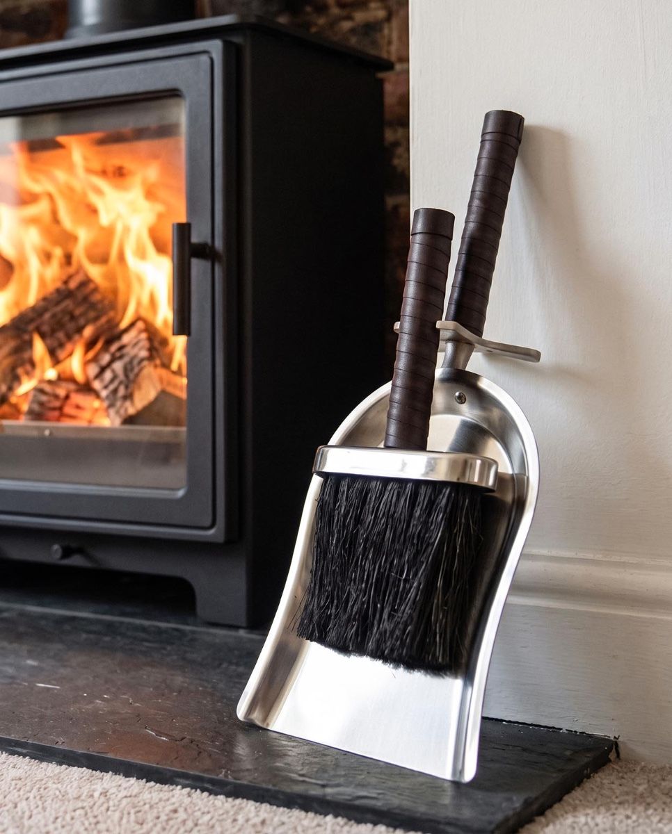 The "Hinkryn Avenue" Brush & Shovel Set next to a Modern White Fireplace - Digital Illustration 