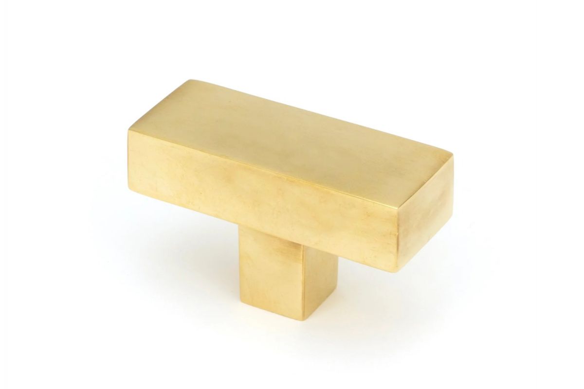 The "Kodiak" Heavyweight Block T-Bar in an Aged Brass Finish on a White Background Displayed at an Angle