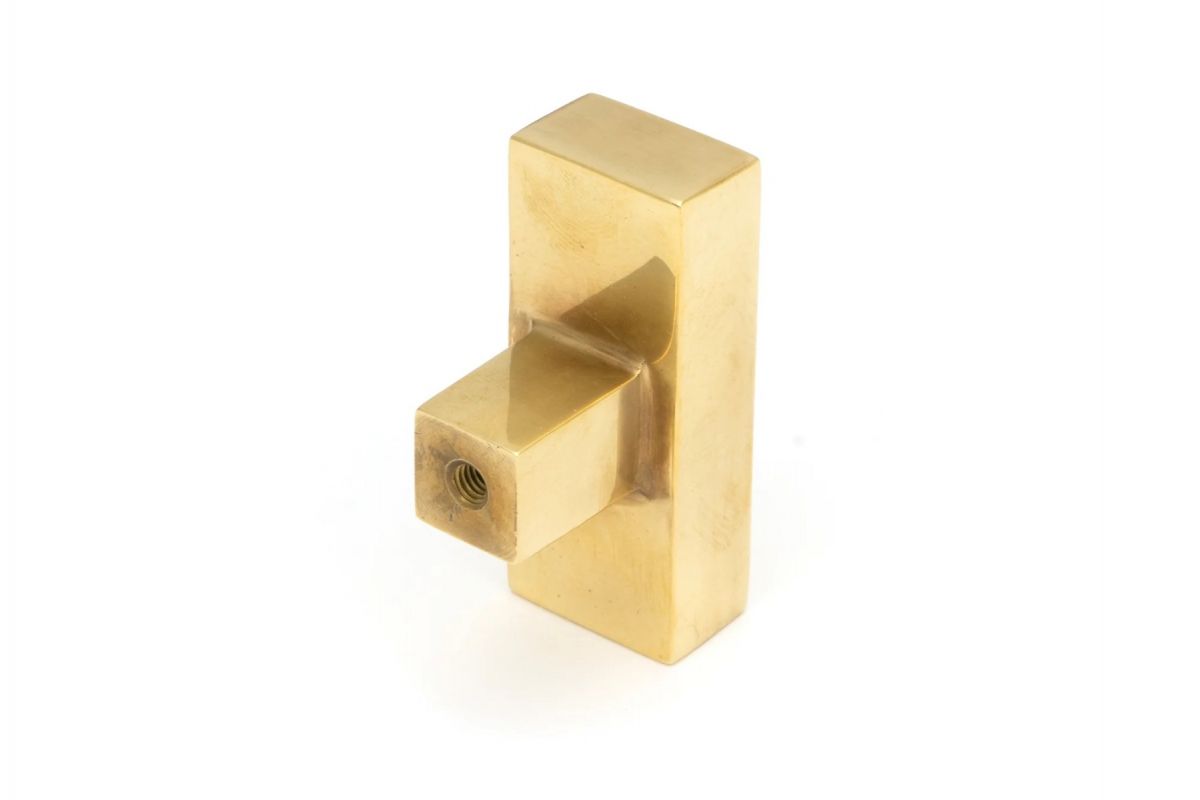 The "Kodiak" Heavyweight Block T-Bar in an Aged Brass Finish on a White Background Displayed from Behind