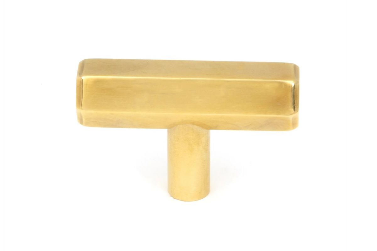 The "Lexington" Hex T-Bar Cabinet Handle in an Aged Brass Finish on a White Background Displayed Front On