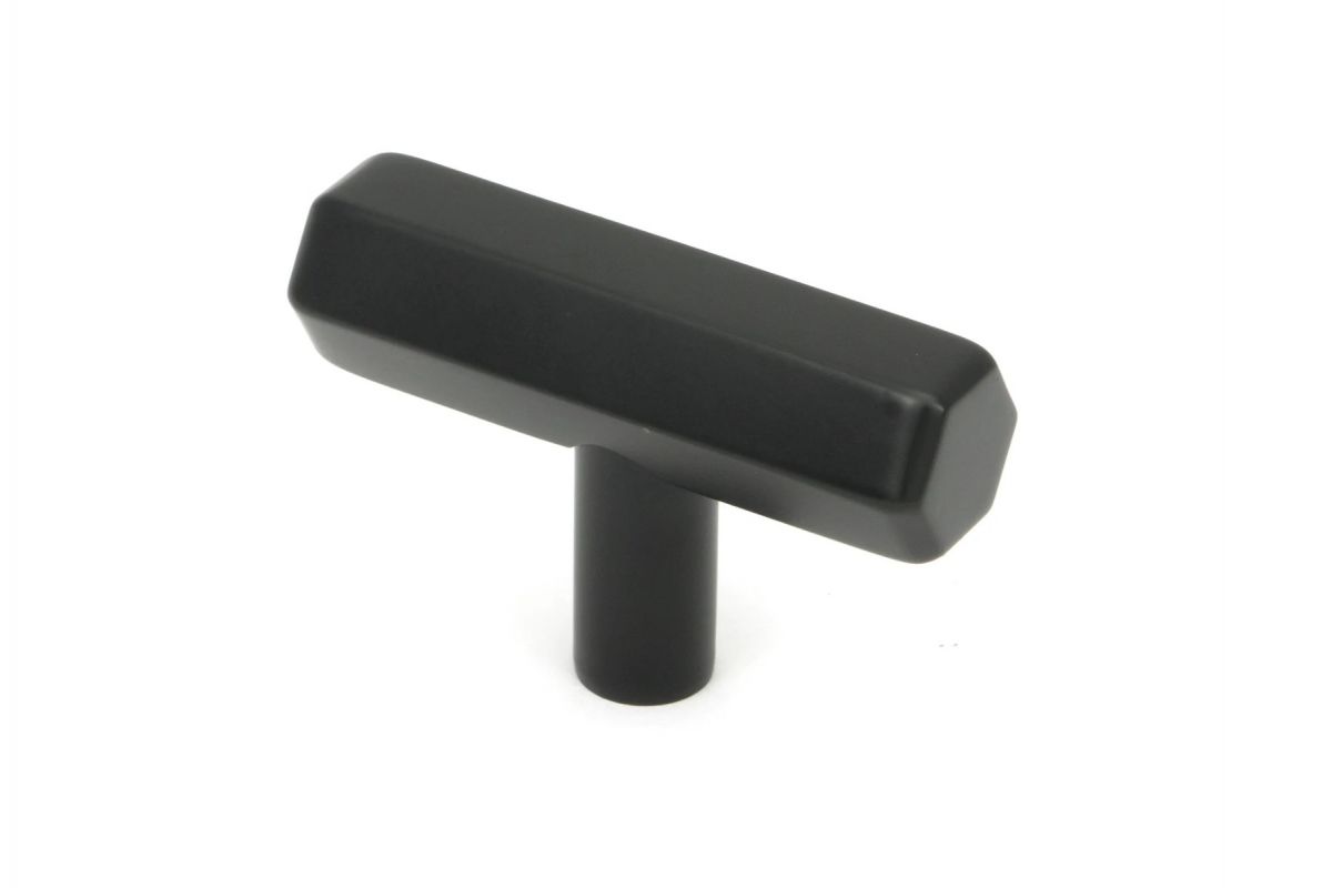 The "Lexington" Hex T-Bar Cabinet Handle in Matt Black on a White Background Shown at an Angle