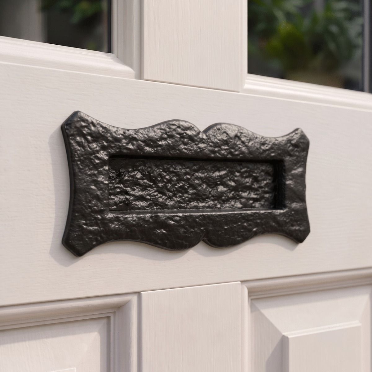 The "Lymmeworth" Blacksmith Style Letter Plate Fitted on a White Wooden Door on a Period Home - Digital Illustration 
