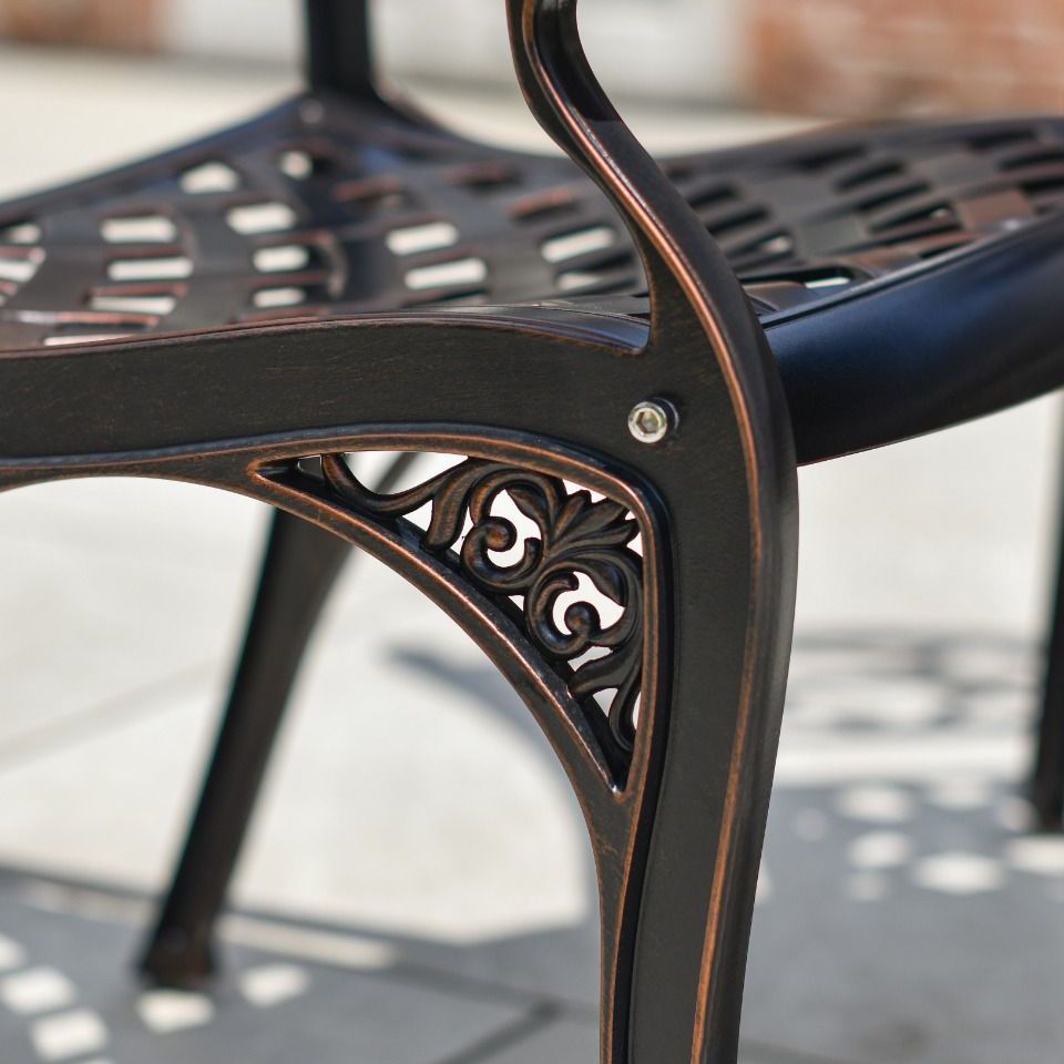 Close-up of the Fleur-de-lys Pattern on the Legs of the Chair