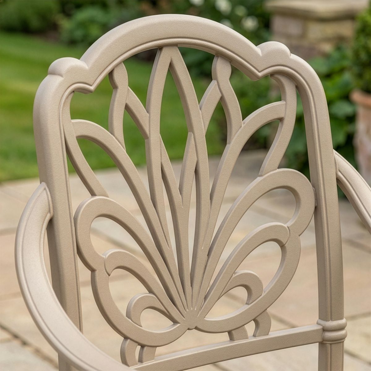 The "Marianne" 8-Seater Outdoor Dining Set - Antique Champagne digital illustration dressed table chair close up