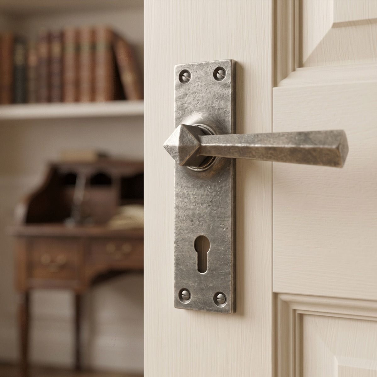 The "Peregrine" Antique Pewter Straight Lever Lock Set  on a Cream Door Leading to a Home Office - Digital Illustration