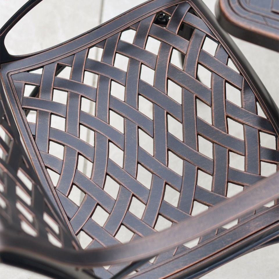 Close-up of the Lattice Design on the Seat of the Chairs