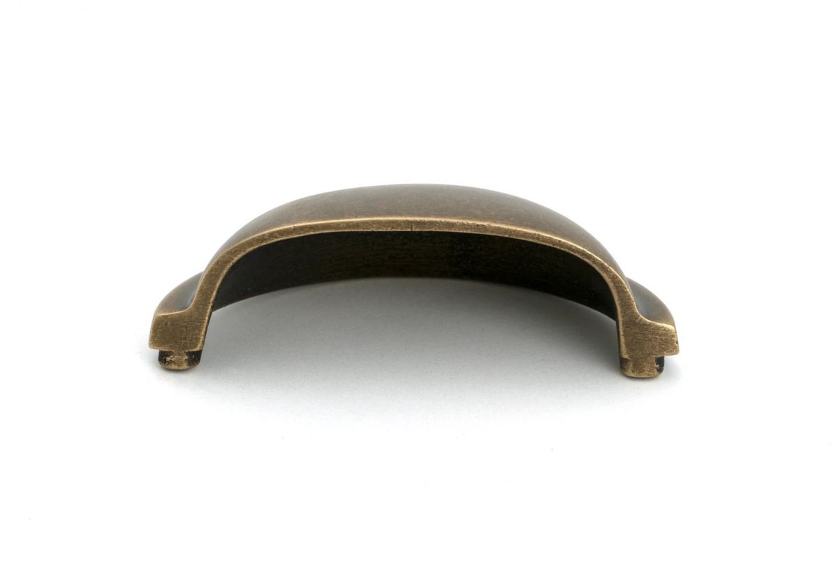The "Stratford" Traditional Cup Handle in a Burnished Brass Finish on a White Background shown from Underneath