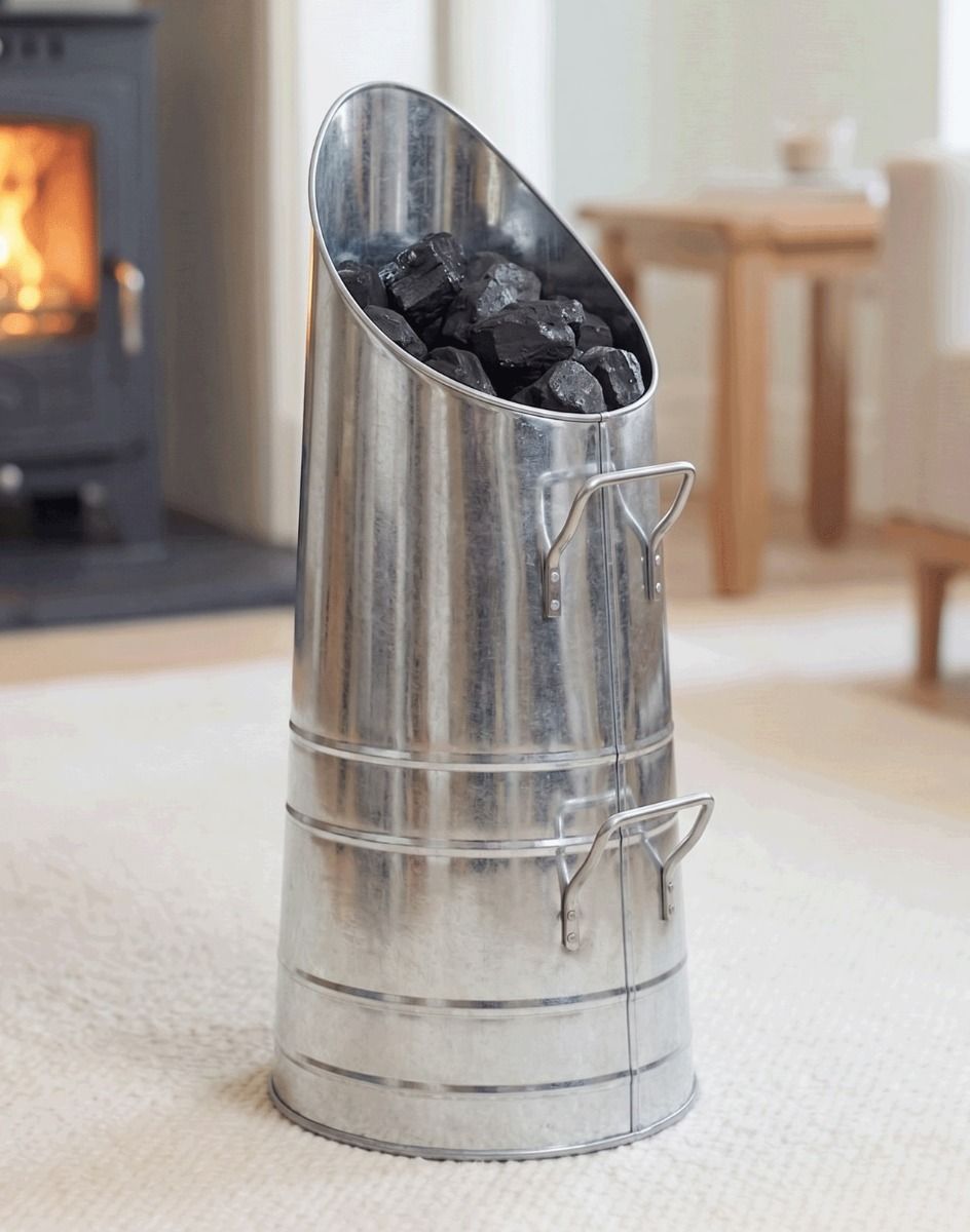 The "The Industrial Mod" Coal Hod Unpainted Version in a Contemporary Home in Front of a Fireplace - Digital Illustration