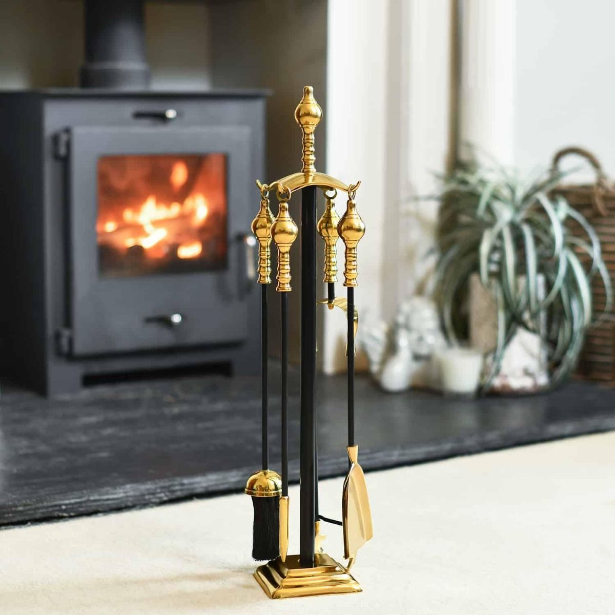 The "Trafalgar" Black Iron & Brass Companion Set with a Wood Burner Stove Behind - Digital Illustration