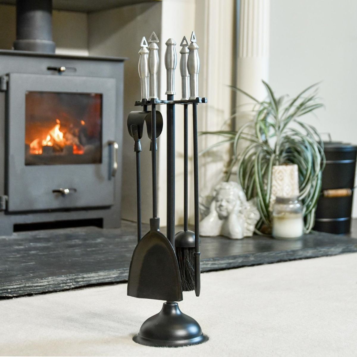 The "York" Aluminium & Black Iron Fireside Companion Set in a Modern Interior Setting next to a Log Burner Stove - Digital Illustration