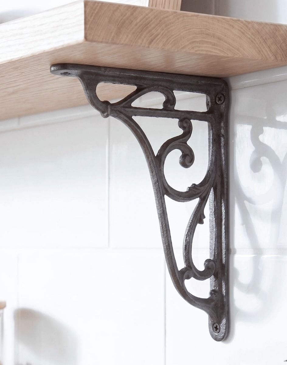 The 24 x 16cm Cast Iron Heritage Wall Bracket Fixed on a White Kitchen Tile Wall for a Wooden Shelf - Digital Illustration 