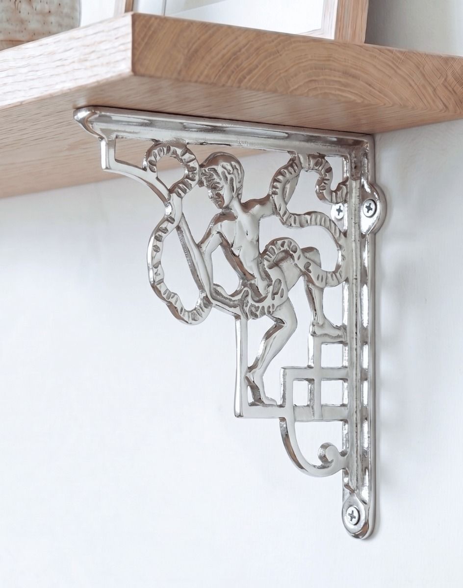 The 24 x 20cm Cherub Design Bright Chrome Bracket on a White Wall in a Modern Home - Digital Illustration