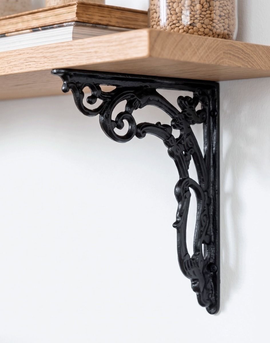 The 24cm x 19cm Ornate Scroll Cast Iron "Victorian Amalina" Bracket Mounted on a Modern White Interior Wall - Digital Illustration 