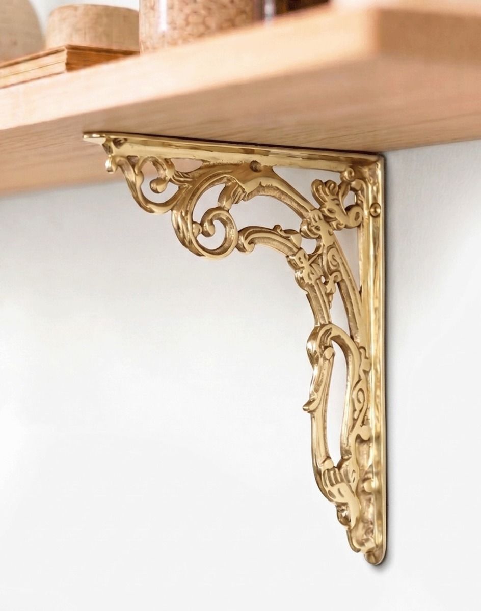 Scroll Bracket in a Polished Brass Finished Used to Support a DIY Shelf in a Modern Home - Digital Illustration 